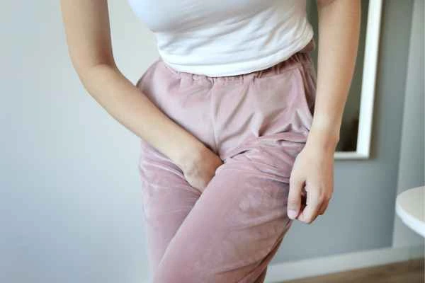 woman struggling with urine incontinence Herefordshire